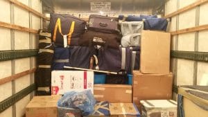 Moving boxes packed truck damaged property